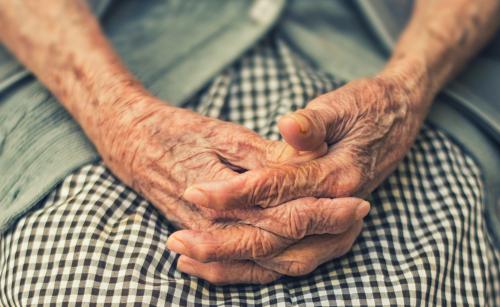 old hands clasped